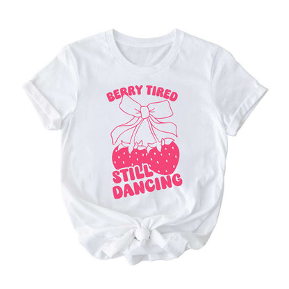 white t-shirt with pink design saying berry tired still dancing with strawberry bow graphic, cute and adorable design for a dancer