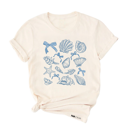 Seaside Charm Cream Summer T-Shirt – Blue Bows & Seashells Design (Kids, Teen & Adult Sizes)