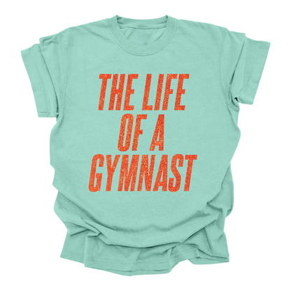 The Life of a Gymnast T-Shirt – Orange Glitter Print (Taylor-Inspired)